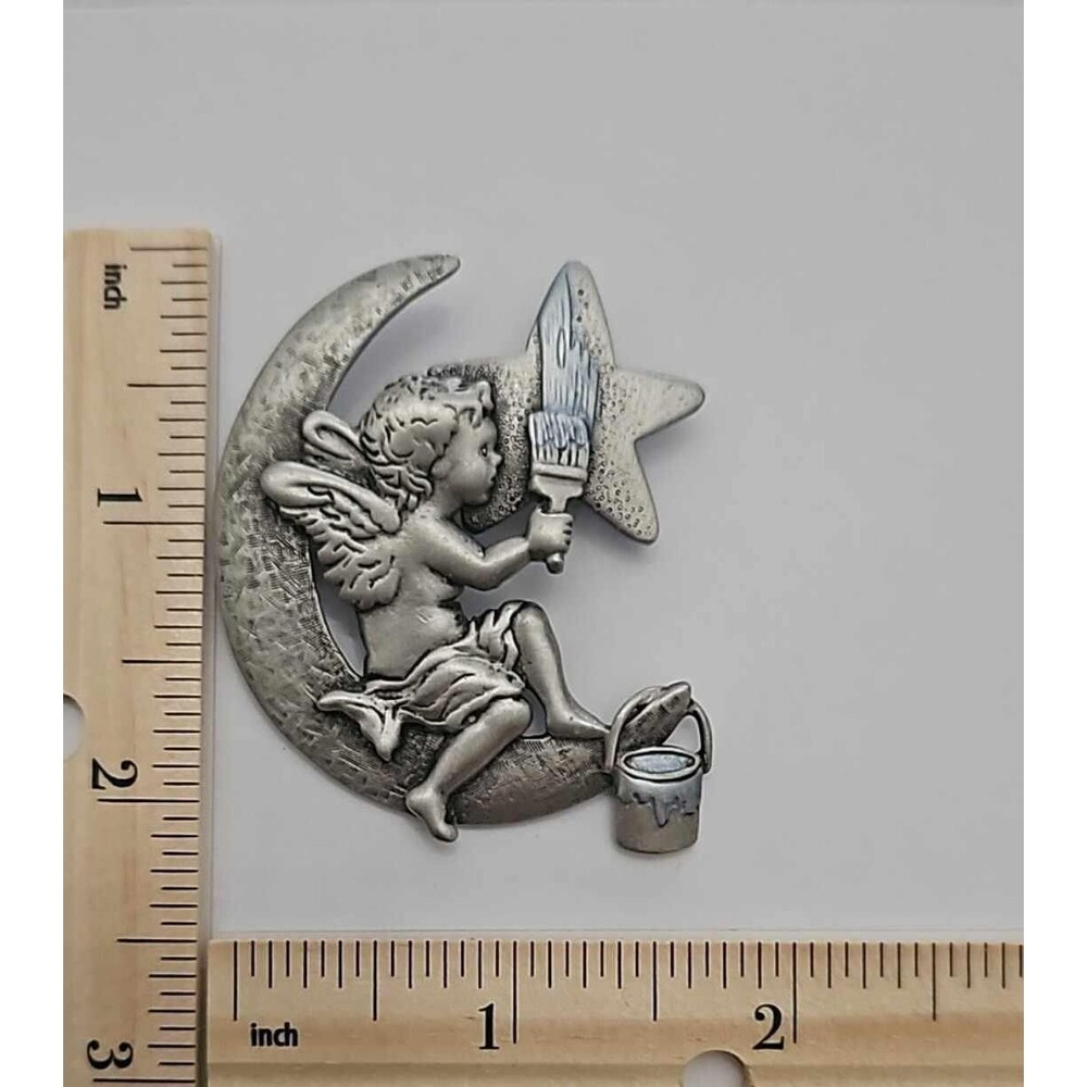 Brooch Angel painting a Star